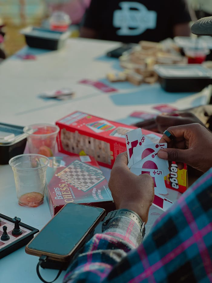 group-enjoying-outdoor-tabletop-games-gathering-35435219 group-enjoying-outdoor-tabletop-games-gathering-35435219